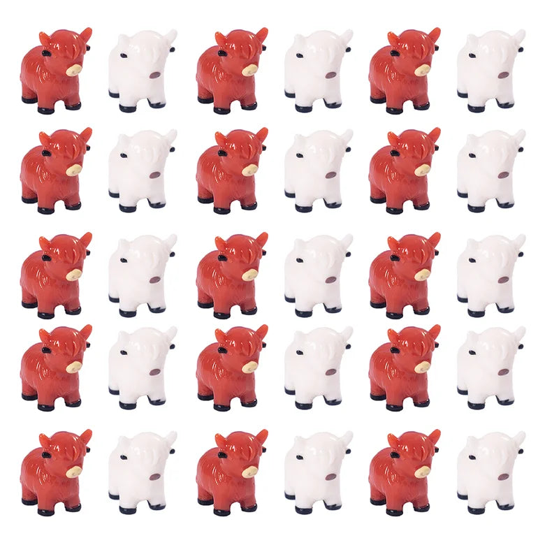 A set of adorable resin Highland cow figurines in various shades of red and white.