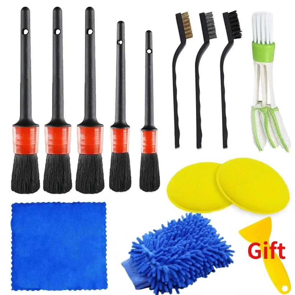 A set of car interior cleaning brushes including various types of brushes and yellow cleaning pads.