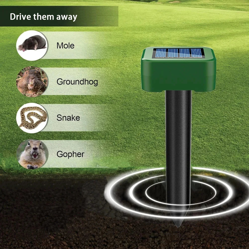A green solar-powered ultrasonic repellent device is shown with icons of mole, groundhog, snake, and gopher to drive animals 