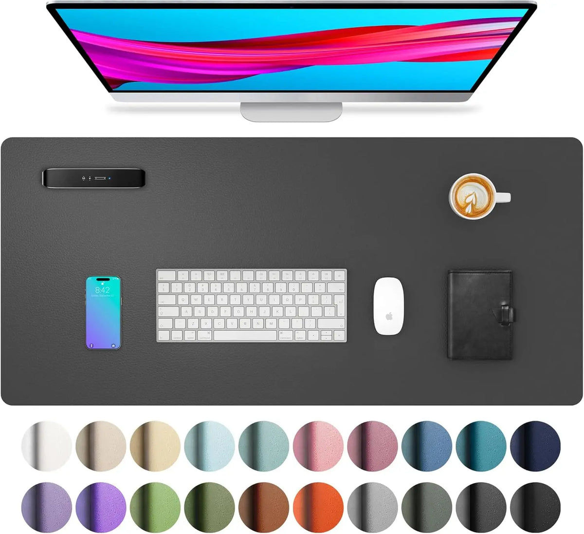A computer monitor, a keyboard, a mouse, and various colored circles are displayed on a dark desk pad.
