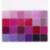 A storage box filled with various colors of 3mm acrylic rice beads arranged in a grid.