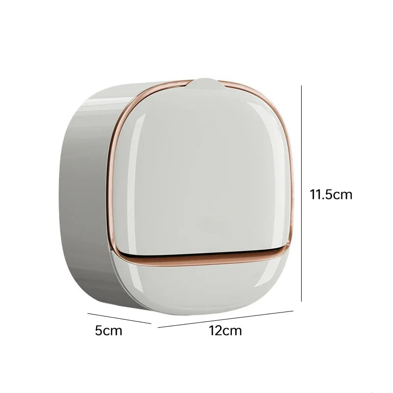 A wall-mounted ABS soap dish with a lid shown in a side view, featuring a smooth, light gray body and a copper-colored rim.