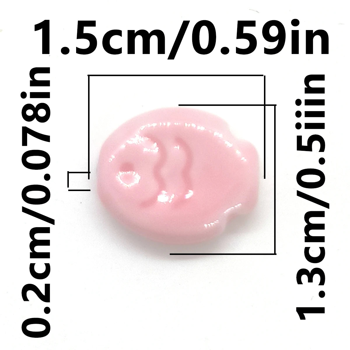 A pink, oval-shaped ceramic fish bead shown with dimension lines indicating its size.