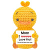 Handmade crochet orange hedgehog doll with a card that says I love you