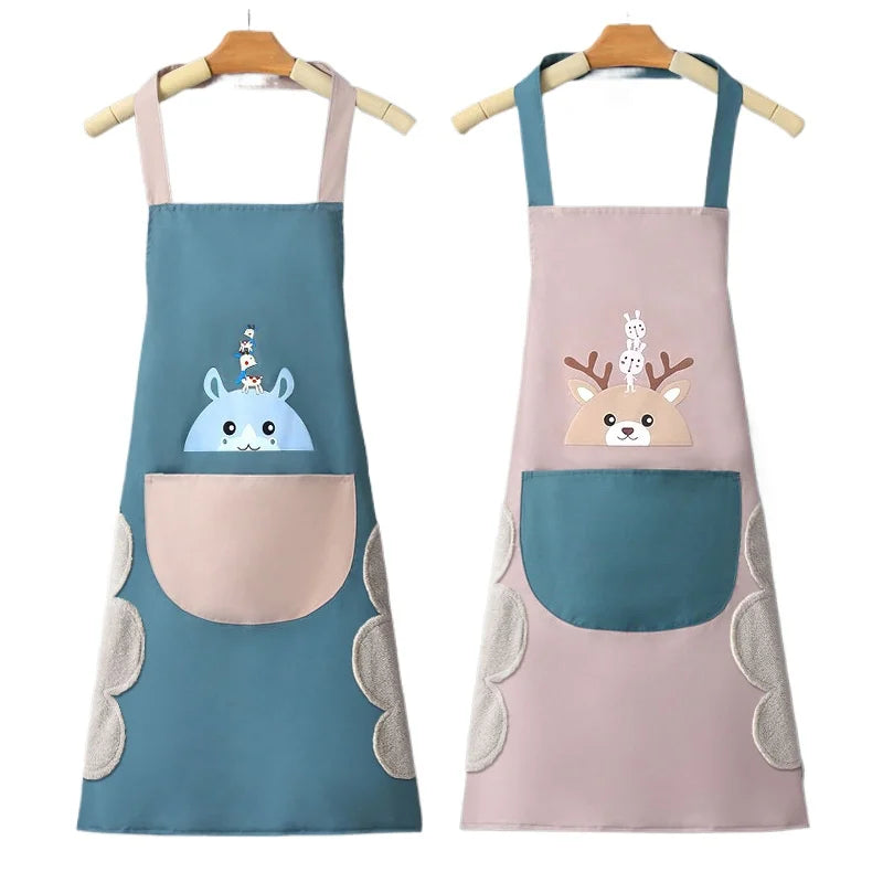 A pair of pastel blue and pink waterproof kitchen aprons with cute animal designs