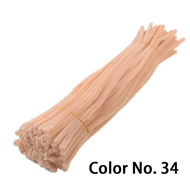 A bundle of light peach colored chenille craft stems labeled Color No. 34