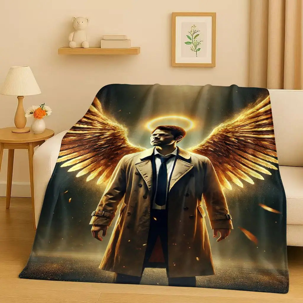 A man with golden wings wearing a coat is featured on a blanket design.