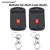 Black remote for a multi-code garage door system with included metal key rings