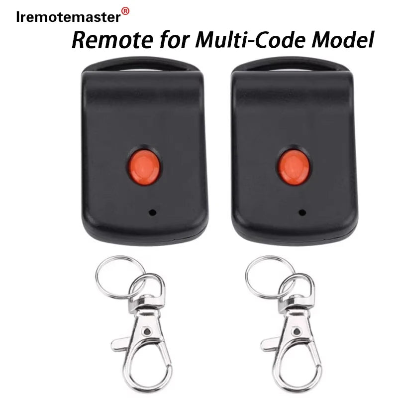 Black remote for a multi-code garage door system with included metal key rings