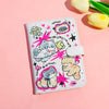 A pink and white cartoon cat-themed leather passport holder featuring cute illustrations of cats and stars.
