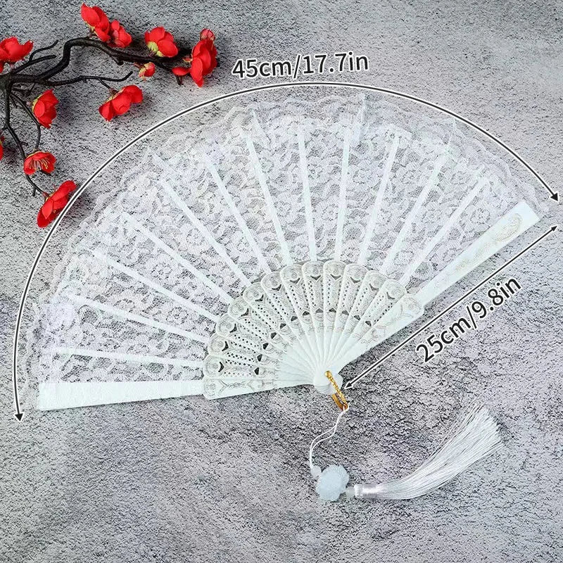 White vintage lace folding hand fan with a durable handle shown against a gray background.