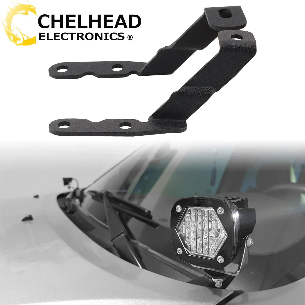Black metal LED fog lamp mounting brackets for GMC and Chevrolet trucks and SUVs.