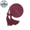 A spool of maroon graduation honor cords with double fringe tassels for ceremonies and crafts.