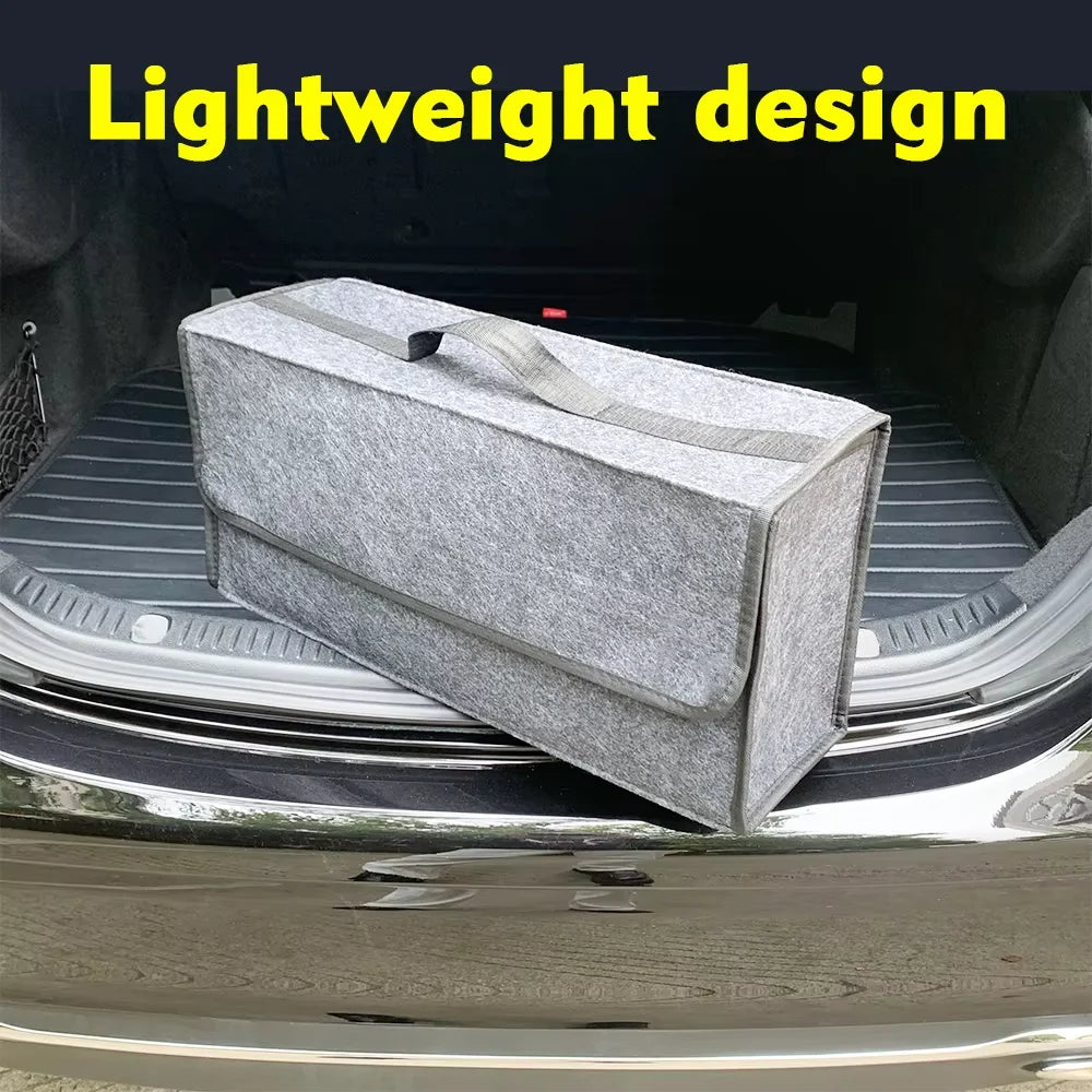 A gray lightweight design foldable boot and trunk organizer placed in a car trunk.