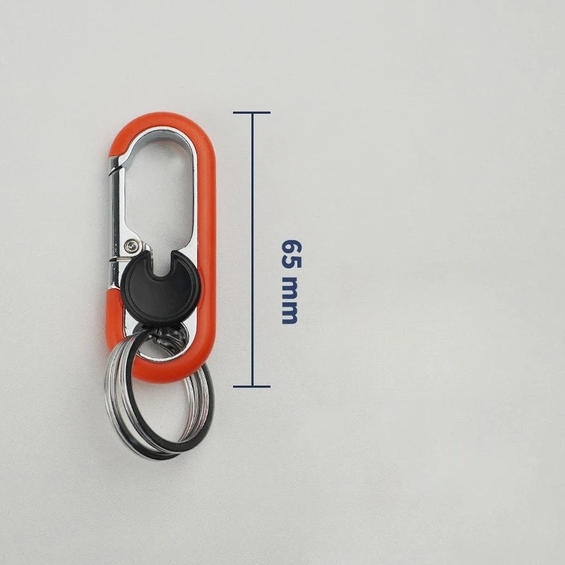 An orange carabiner keychain with a slide lock mechanism and a metal split ring, shown against a white background.