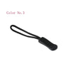 A black plastic zipper pull with a thin cord attached, labeled Color No. 3.