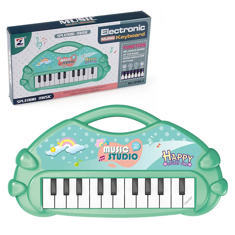 A green electronic music keyboard toy with a microphone and a matching carrying case.