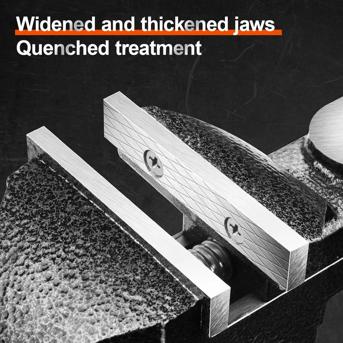 Close-up of a widened and thickened jaws quenched treatment on a 360° swivel clamp-on table vise.