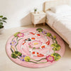 Round plush rug with a pink background featuring colorful koi fish and green leaves