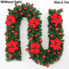 Green artificial Christmas garland with red flowers and berries, measuring 2.7 meters long.
