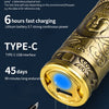 A close-up of a gold-colored electric shaver with a Type-C interface and various indicators for charging and battery life.