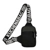 Black canvas chest bag with black strap featuring the text KUCHEN&BAG 1980