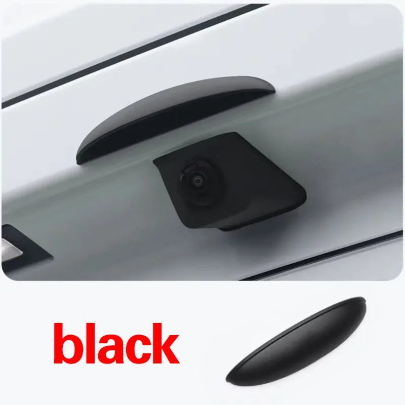 A close-up view of a black universal car rear camera rain cover or protective shield.