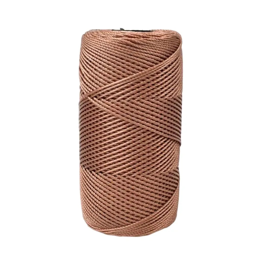 A spool of soft, light brown ice cotton silk thread used for knitting and crochet.