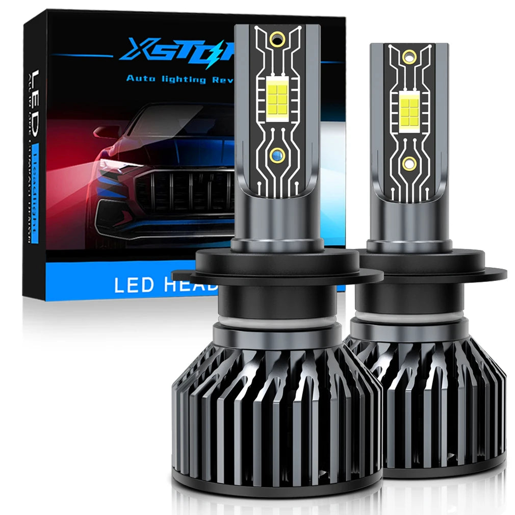 A set of XSTORM LED car headlight bulbs and mounting bases for auto lighting conversion.