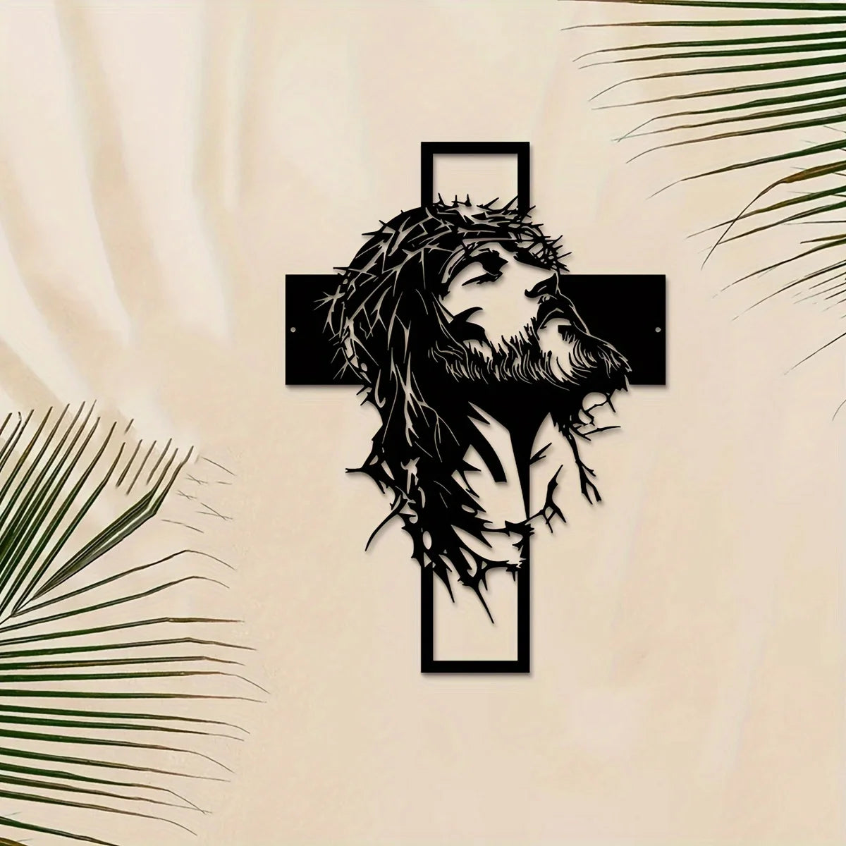 Silhouette de la tête et de la barbe de Jésus dans une croix sur fond clair.