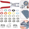 A set of metal snap buttons and pliers for DIY sewing projects, showing various sizes and tools.