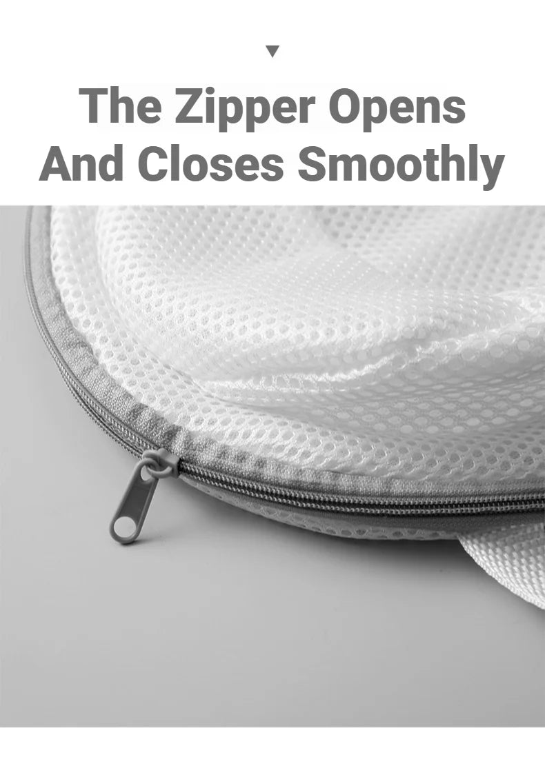 Close-up of a zippered mesh laundry bag for bras and lingerie showing the smooth operation of the zipper.