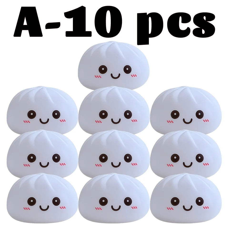 Paquete de juguetes antiestrés comestibles tipo dumpling blancos y brillantes A-10