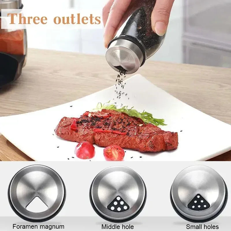 A set of three rotating glass spice jars with different sized holes for grinding spices.