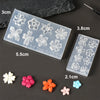 Clear silicone nail art molds featuring various floral shapes and petals for 3D designs