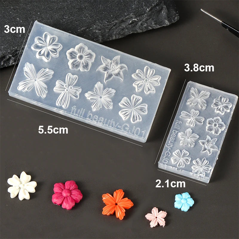 Clear silicone nail art molds featuring various floral shapes and petals for 3D designs