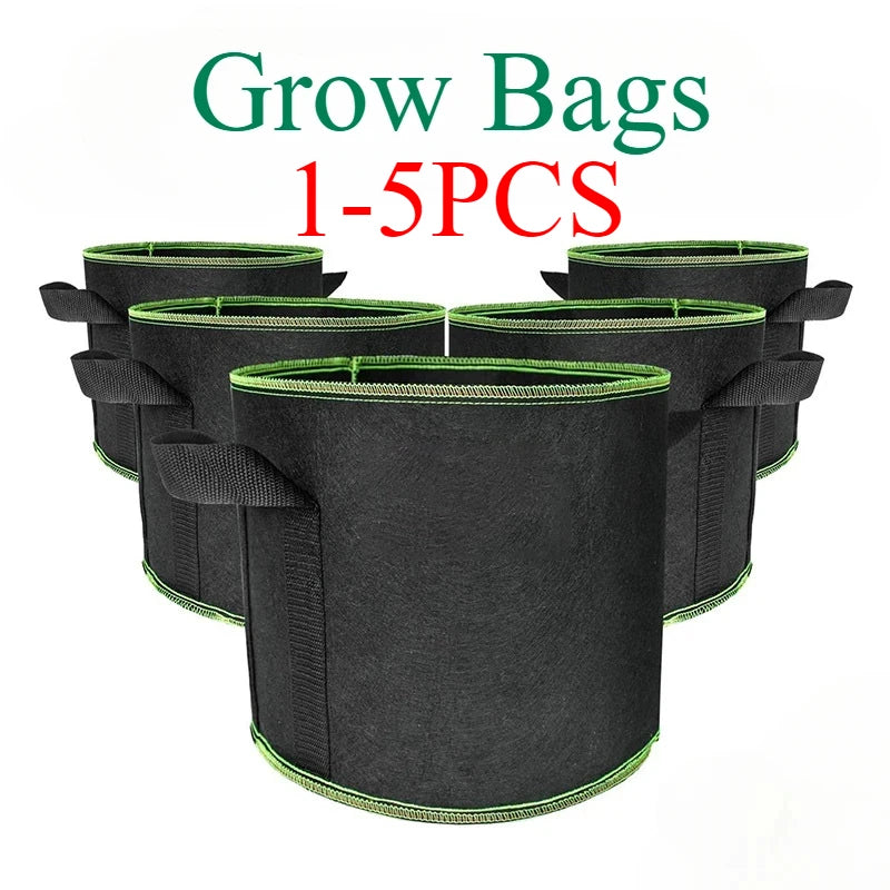 A stack of five black heavy-duty non-woven fabric grow bags for gardening and planting.