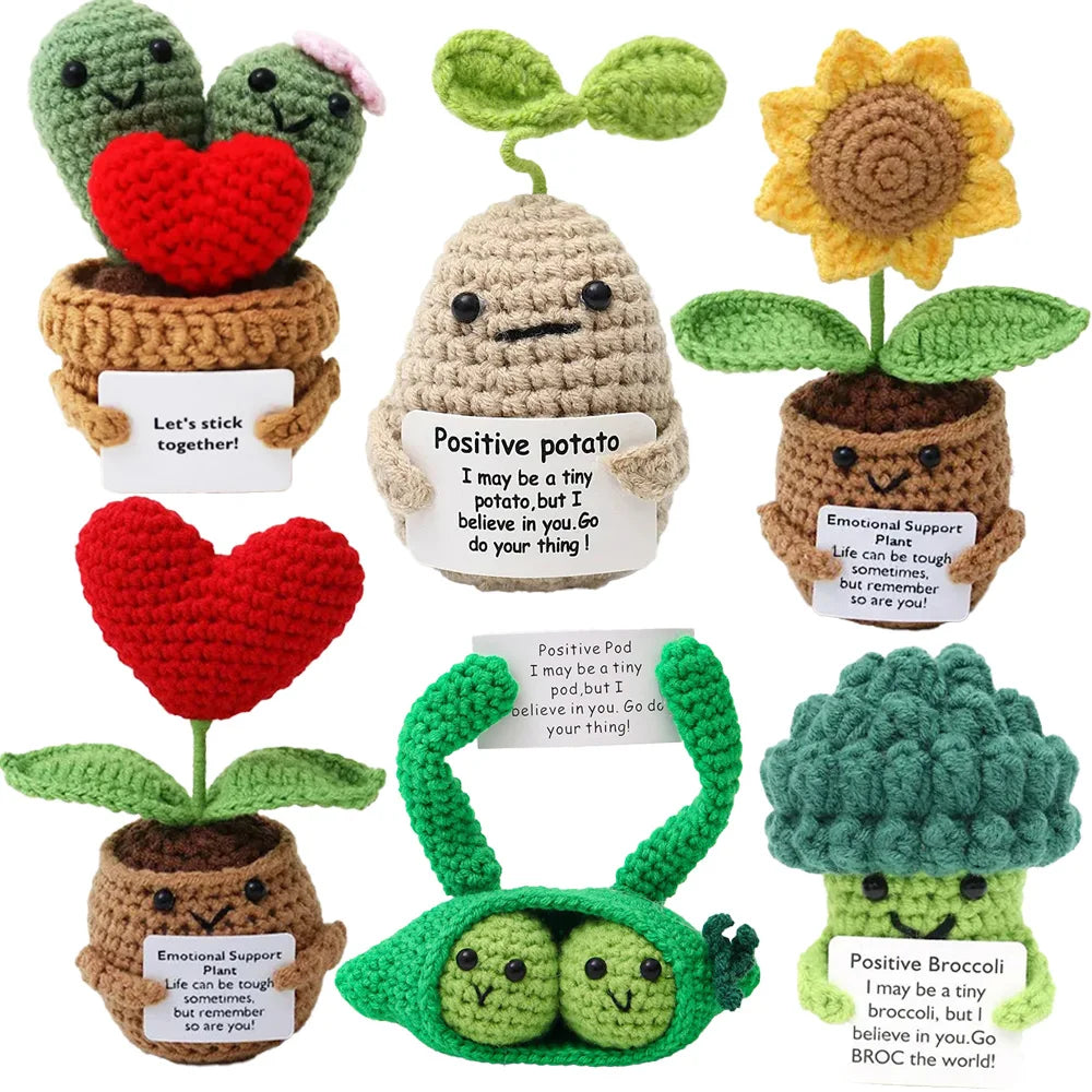 Handmade crochet pocket hug dolls featuring various insects and plants with positive messages