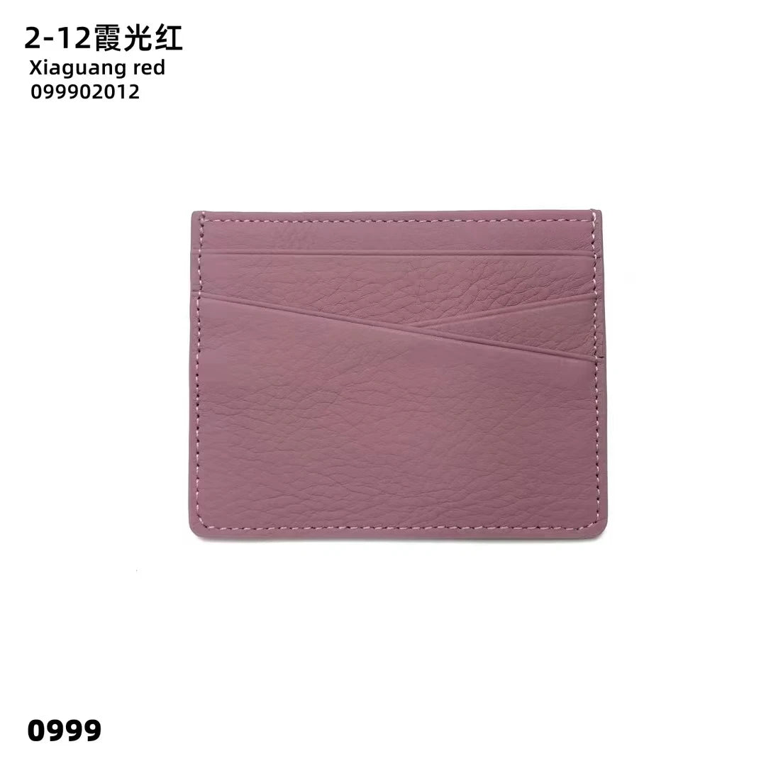 A mauve genuine leather slim card holder wallet.