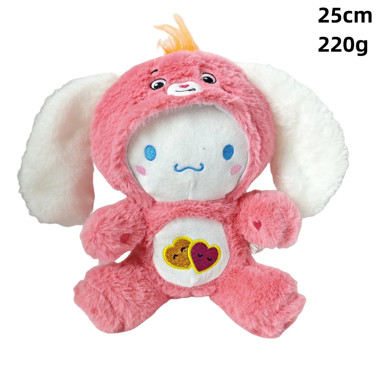 Peluche Kawaii Care Bear arcoíris rosa con orejas blancas y un parche de corazón amarillo en el pecho.