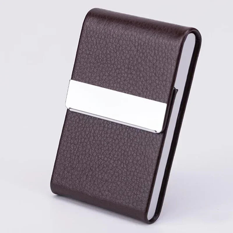 A dark brown slim card holder made of PU leather with a silver metal strip.