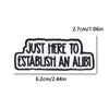 Black embroidered iron-on patch with the text JUST HERE TO ESTABLISH AN ALIBI