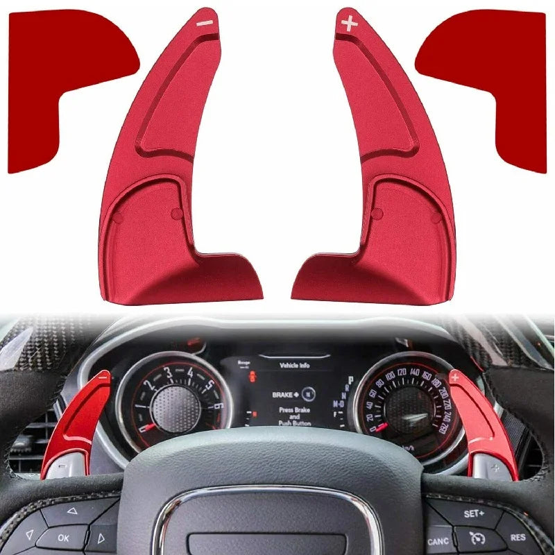 Red anodized aluminum shift paddle extenders shown in various angles and context within a car interior.