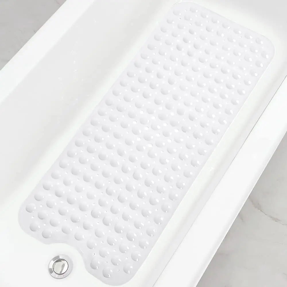 A white non-slip bathtub mat with suction cups and drain holes is shown on a marble surface.