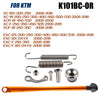 KTM side stand kit components including springs, bolts, and an orange aluminum foot.