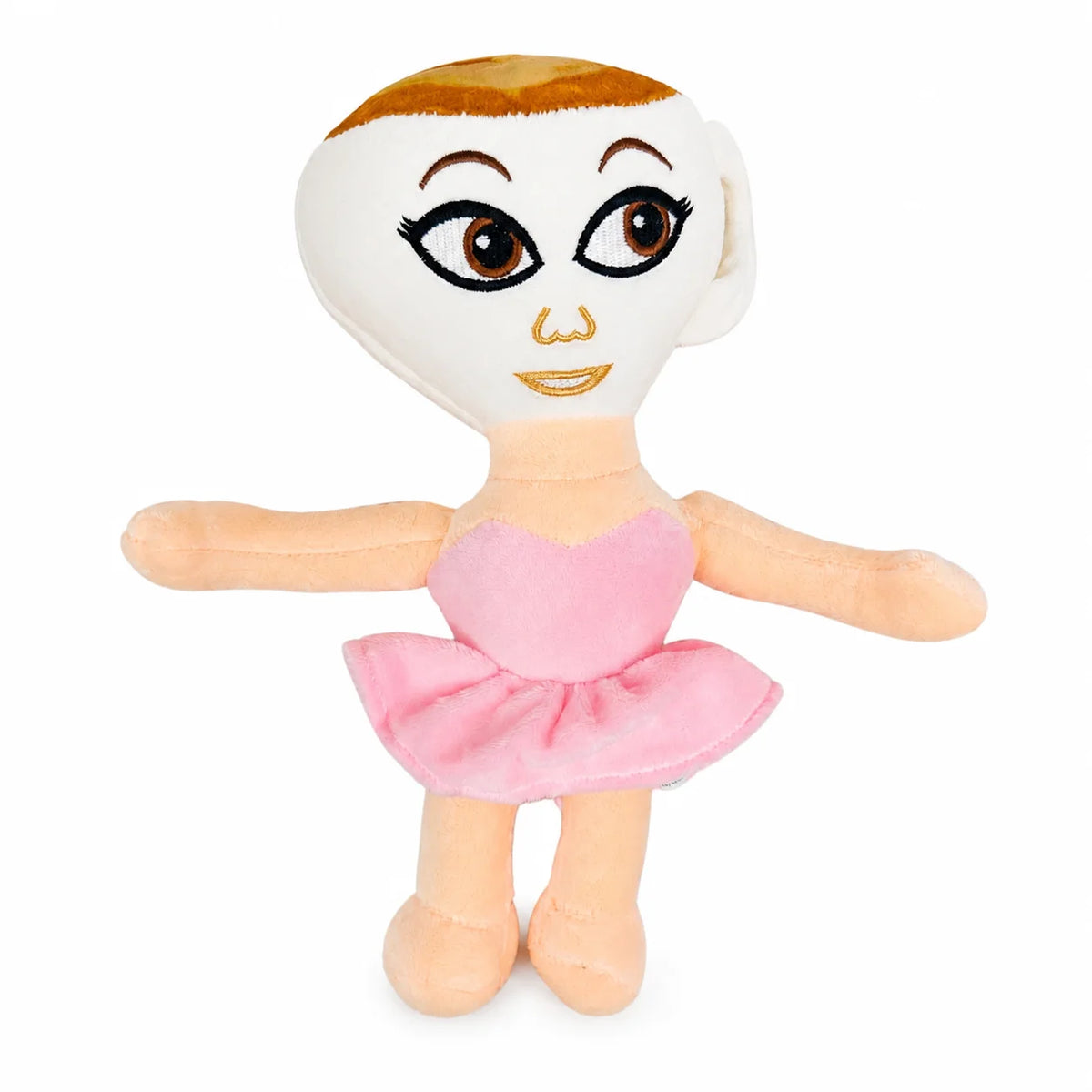 A soft pink and orange plush toy resembling a shark with large eyes and a tutu skirt.