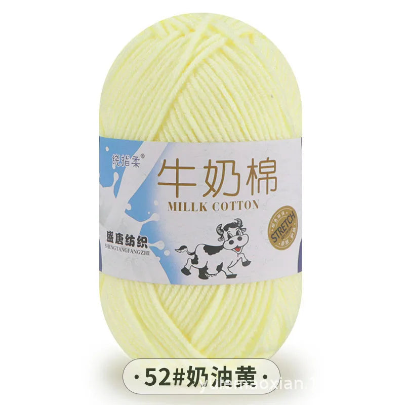 A ball of yellow milk cotton blend yarn for knitting and crochet projects.