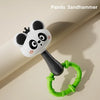 A panda-themed sandhammer toy with a black handle and green ring, designed for baby sensory play.