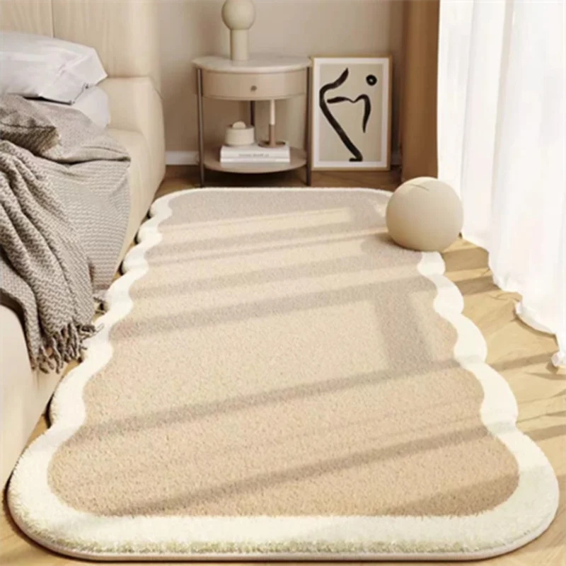 A plush beige decorative area rug with subtle striped shadows is placed on a light wood floor.