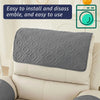 Gray quilted headrest protector covers for a recliner chair.
